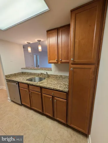 a view of a kitchen with a sink