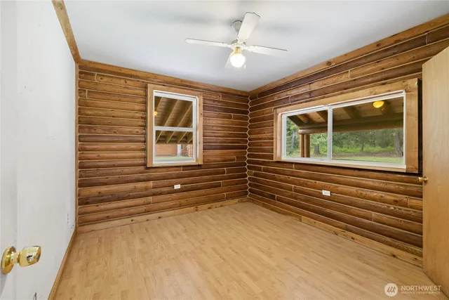 a view of that has a bed and a window