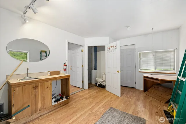 a room with a window and gym equipment