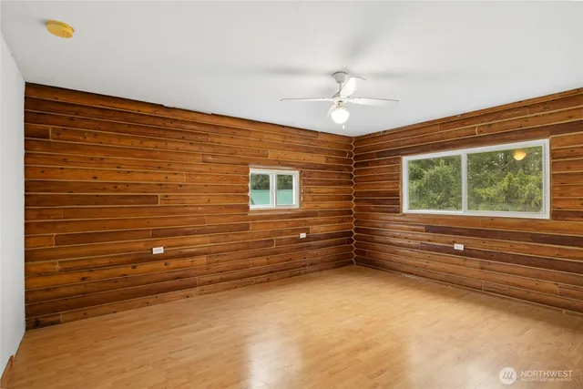 a view of empty room with windows