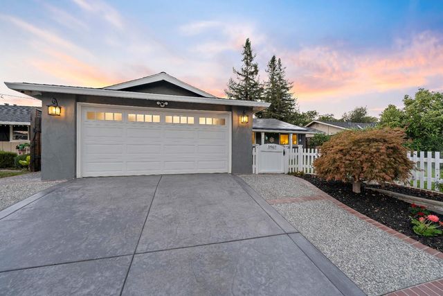 a view of a house with a garage