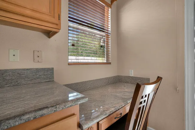 a view of a kitchen area and microwave