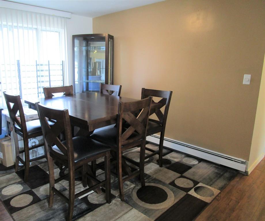 84 Temi Road Brockton, MA 02302 - Photo 5 of 28 a view of a dining room with furniture and wooden floor