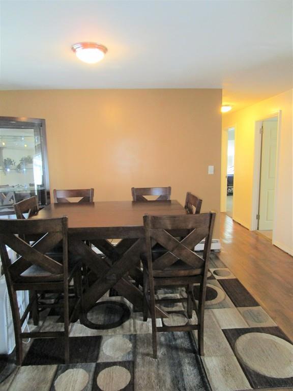 84 Temi Road Brockton, MA 02302 - Photo 6 of 28 a view of a dining room with furniture and wooden floor