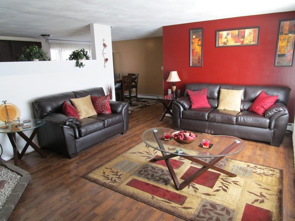 84 Temi Road Brockton, MA 02302 - Photo 8 of 28 a living room with furniture and wooden floor