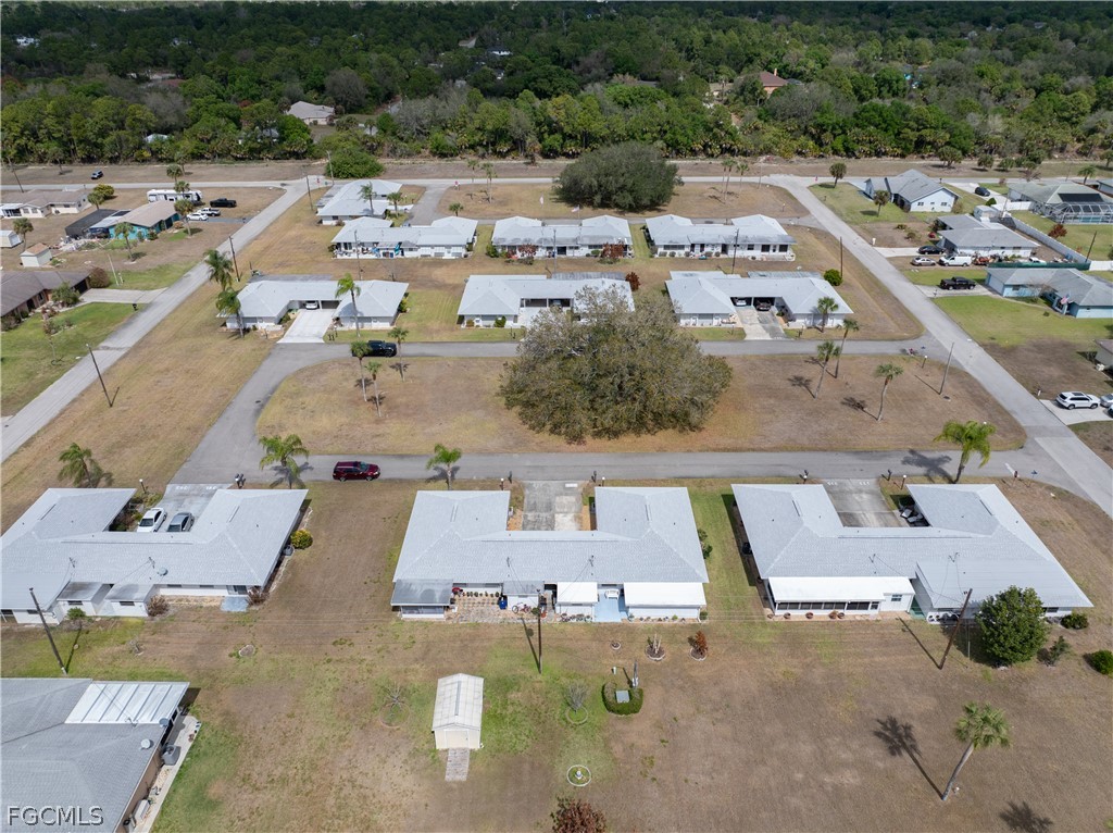 337 Richland Road Lehigh Acres, FL 33936 - Photo 20 of 31 an aerial view of a city with lots of residential buildings