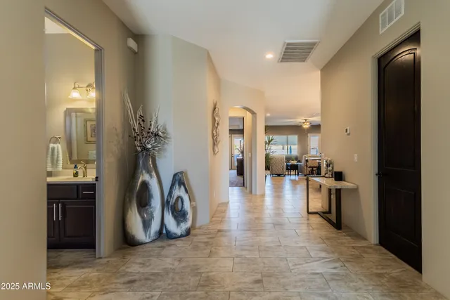 a view of a living room and entry way
