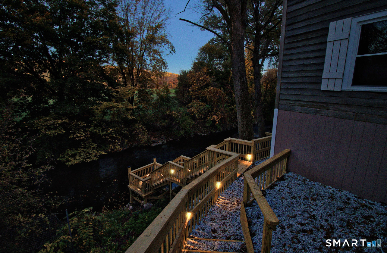 15 Lower Road North Canaan, CT 06018 - Photo 31 of 36 a view of a backyard with plants and a patio