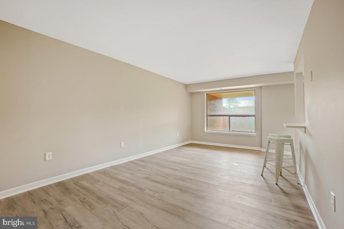 8007 Mandan Road, Unit 201 Greenbelt, MD 20770 - Photo 3 of 30 Brand new paint and flooring.
