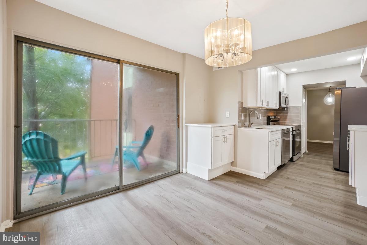 8007 Mandan Road, Unit 201 Greenbelt, MD 20770 - Photo 6 of 30 Custom kitchen and work space.