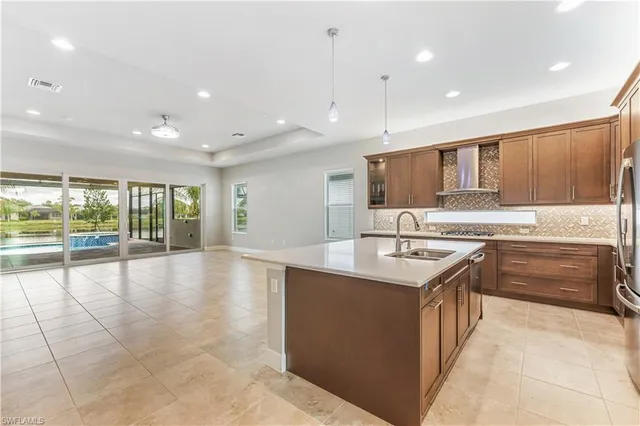a large kitchen with cabinets