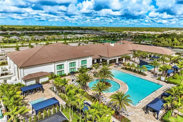 a view of a yard with an outdoor seating