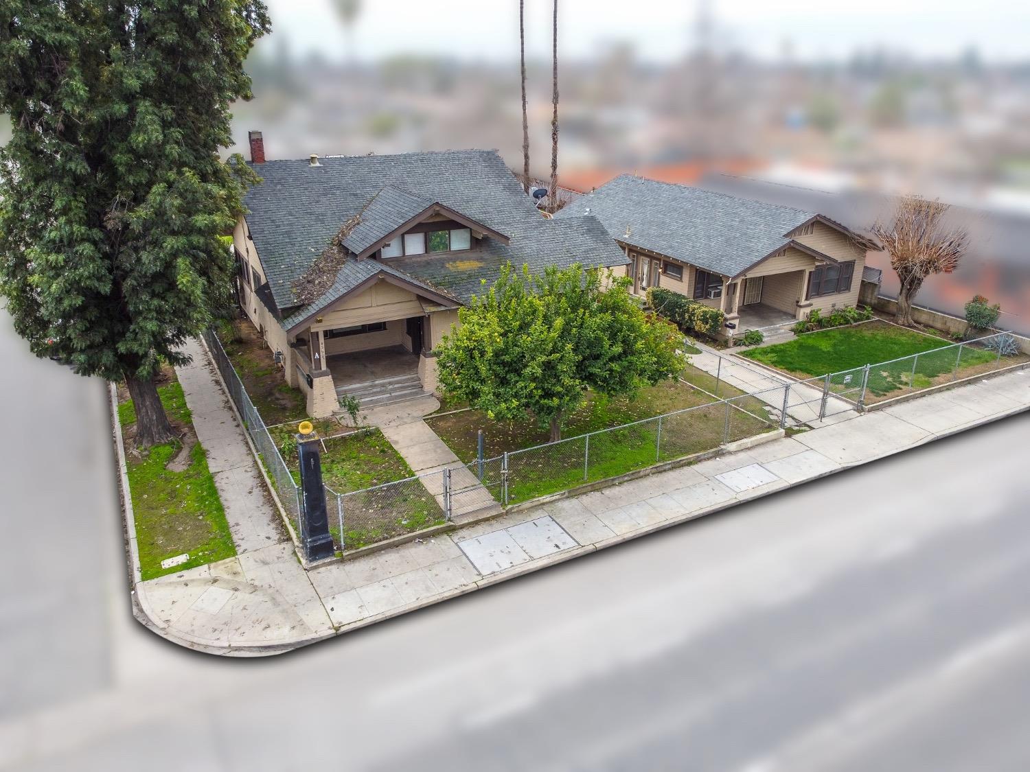 a view of a house with a street