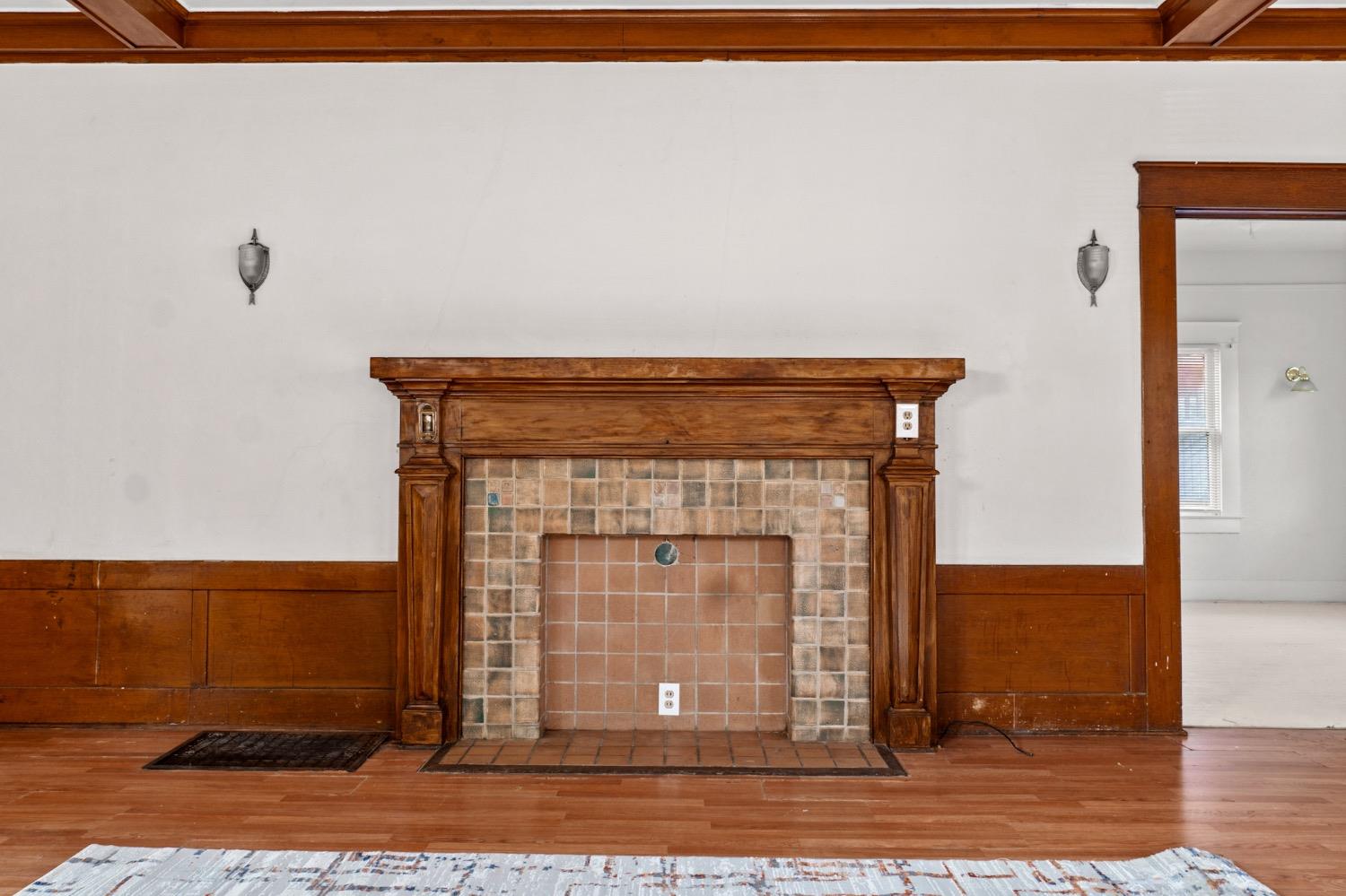 4354 East Kings Canyon Road Fresno, CA 93702 - Photo 11 of 87 a view of fireplace and wooden floor
