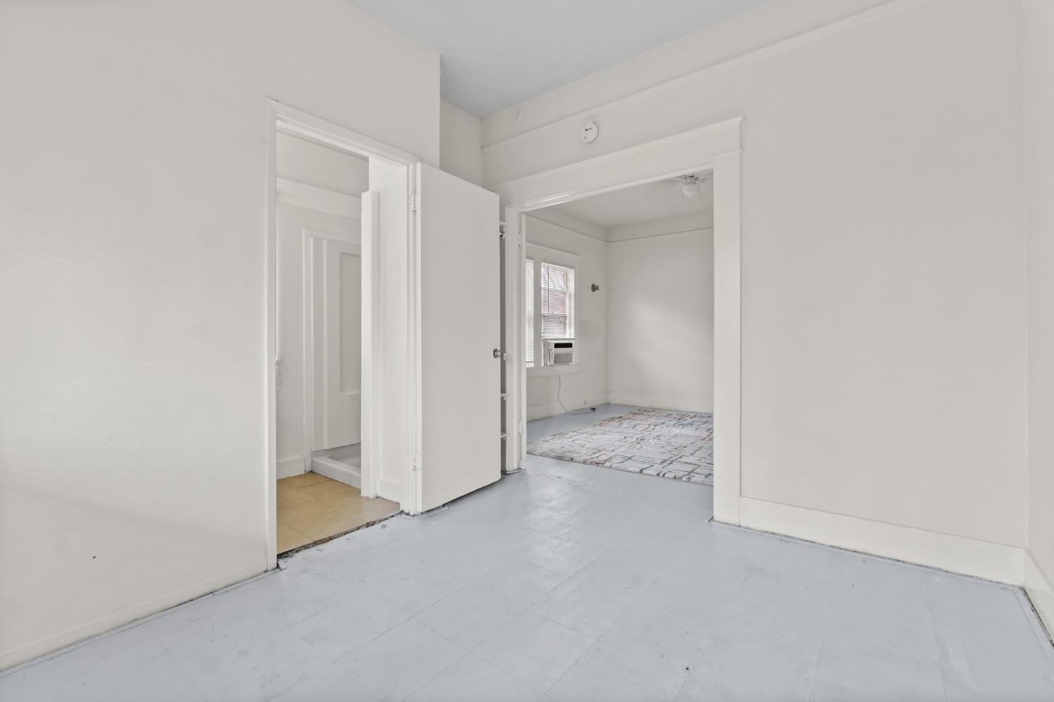 4354 East Kings Canyon Road Fresno, CA 93702 - Photo 19 of 87 an empty room with a bathroom