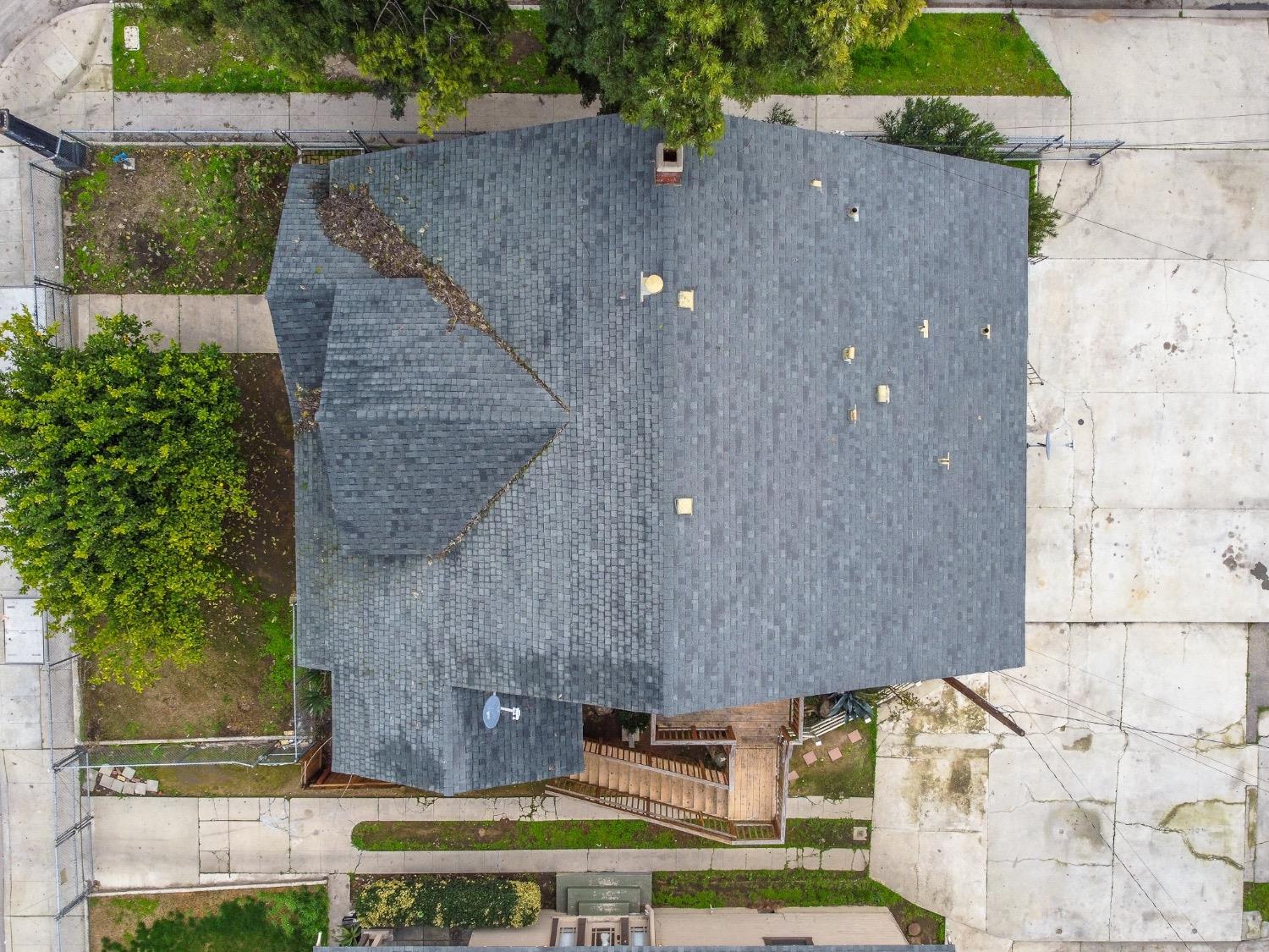 4354 East Kings Canyon Road Fresno, CA 93702 - Photo 31 of 87 an aerial view of a house with a yard