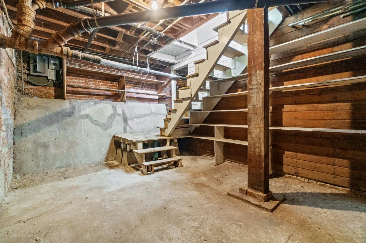 4354 East Kings Canyon Road Fresno, CA 93702 - Photo 54 of 87 a view of an empty room with wooden walls