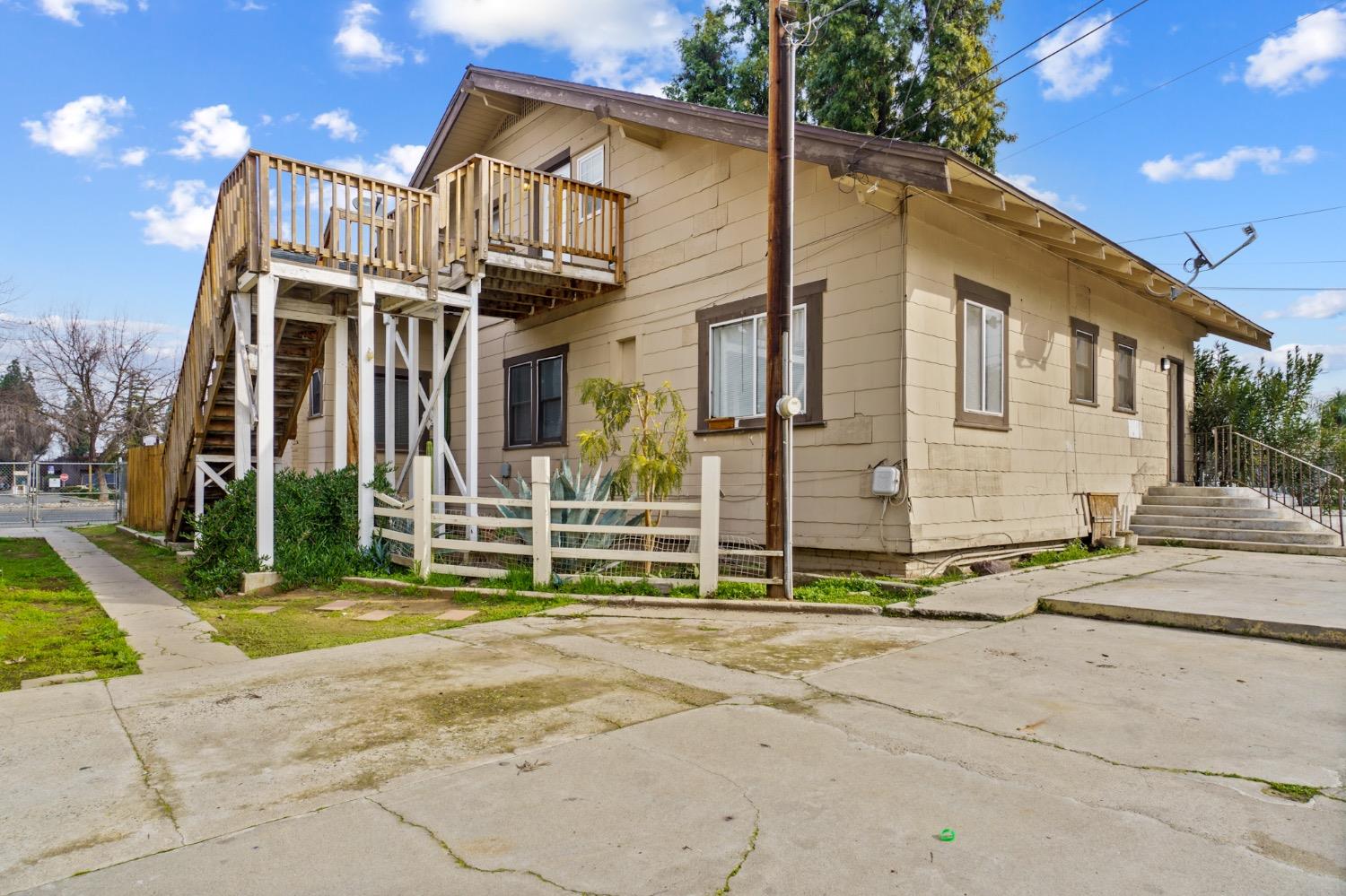 4354 East Kings Canyon Road Fresno, CA 93702 - Photo 56 of 87 a view of a house with a street