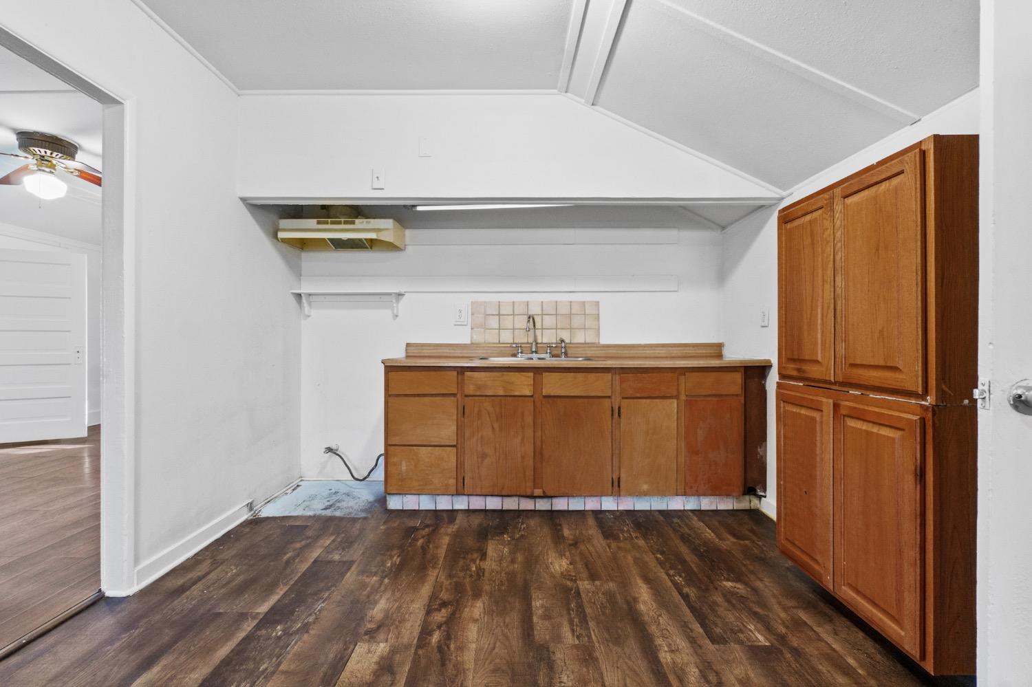 4354 East Kings Canyon Road Fresno, CA 93702 - Photo 60 of 87 a kitchen with a stove and a refrigerator
