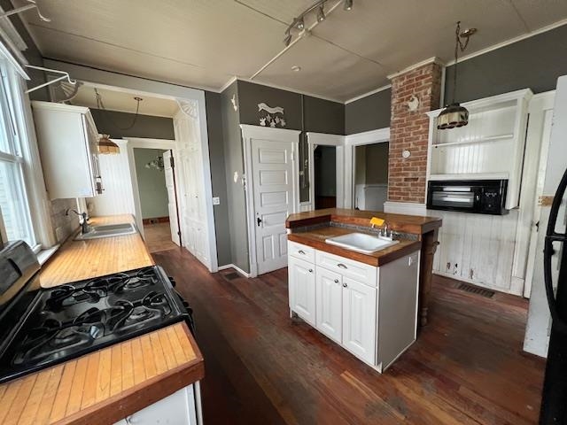 642 West Stephenson Street Freeport, IL 61032 - Photo 12 of 38 a kitchen with stainless steel appliances granite countertop a stove and a refrigerator