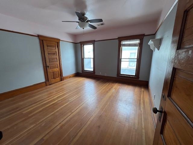 642 West Stephenson Street Freeport, IL 61032 - Photo 4 of 38 a view of livingroom with hardwood floor and window