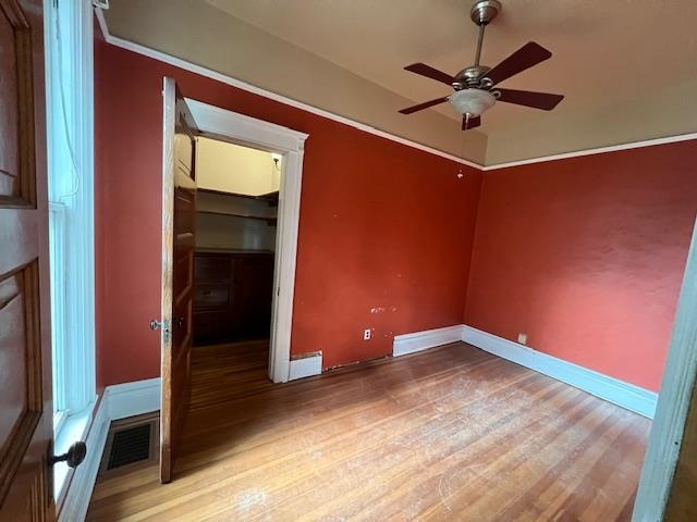 642 West Stephenson Street Freeport, IL 61032 - Photo 5 of 38 an empty room and chandelier fan