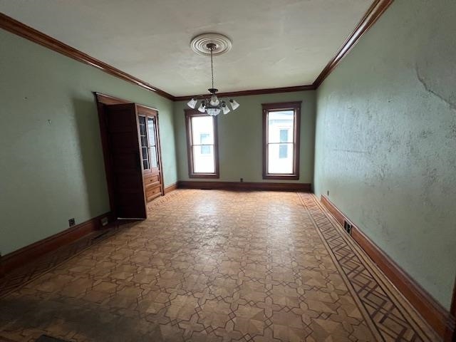 642 West Stephenson Street Freeport, IL 61032 - Photo 7 of 38 a view of a room with window and chandelier
