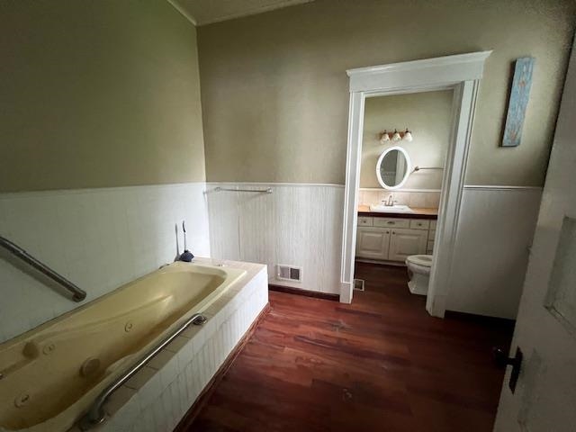 642 West Stephenson Street Freeport, IL 61032 - Photo 10 of 38 a bed room with a bed and a mirror