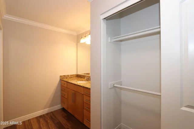 a room with a stove and a refrigerator