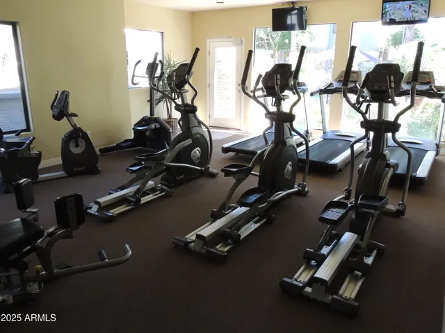 a view of a room with gym equipment