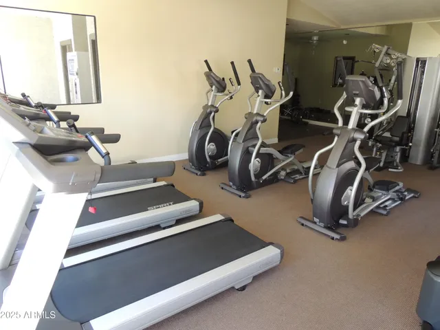 a view of a room with gym equipment