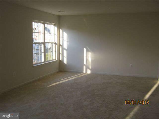 3406 Kidder Road Clinton, MD 20735 - Photo 23 of 26 an empty room with windows