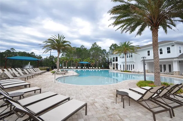 a view of a garden with a apartment