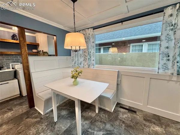 a view of a dining room with furniture
