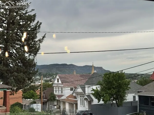 a view of city with tall buildings