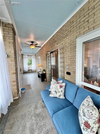 a living room with furniture and a couch