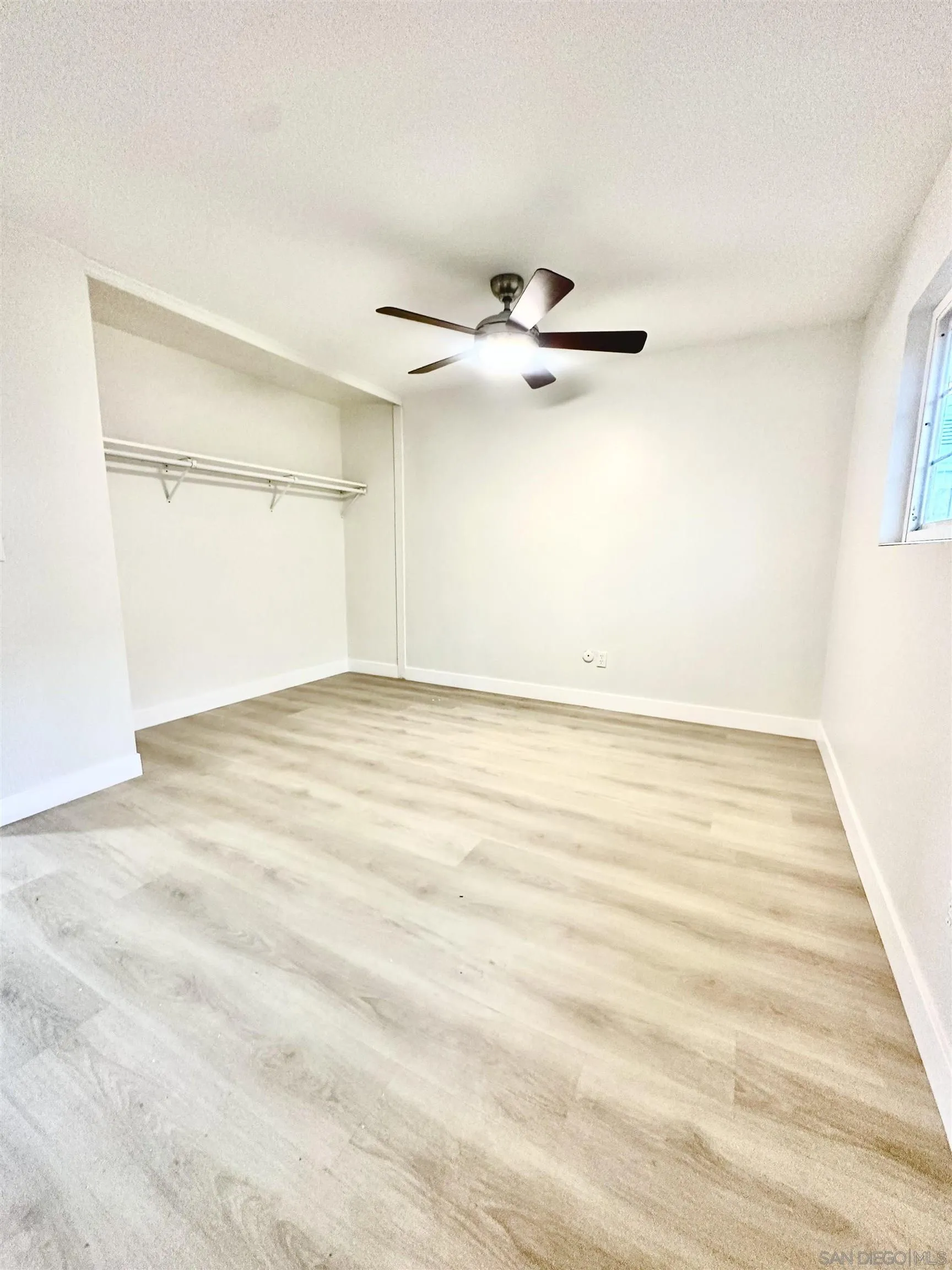 13534 Mountainside Drive Poway, CA 92064 - Photo 7 of 9 wooden floor in an empty room