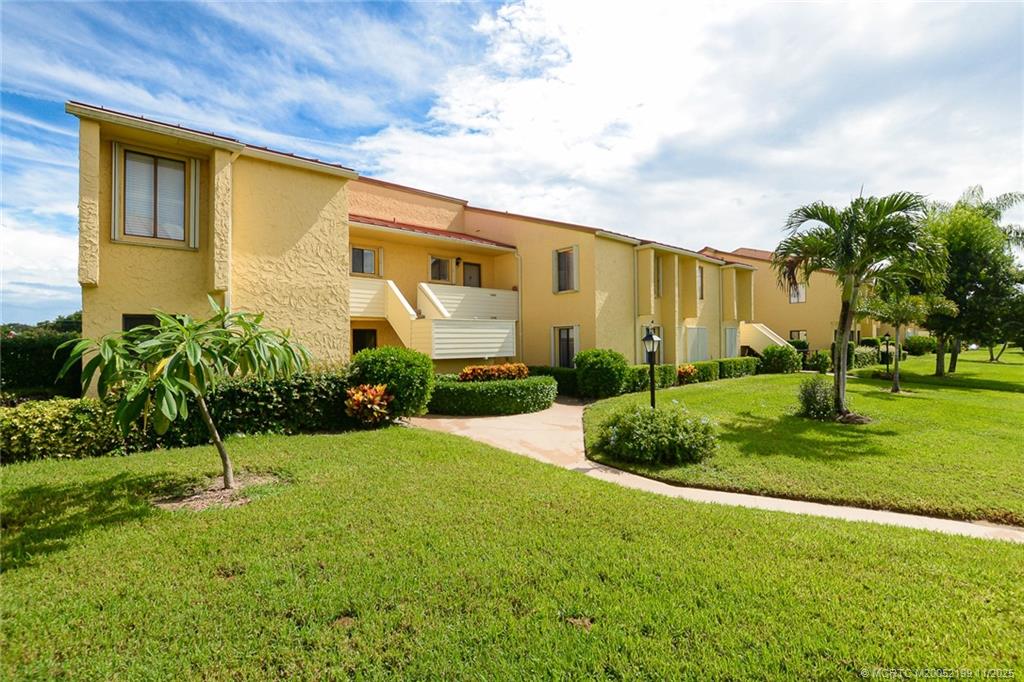 a view of a back yard of the house