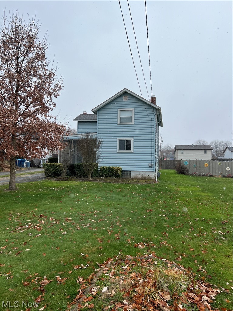 545 7th Street Struthers, OH 44471 - Photo 2 of 17 View of property exterior featuring a yard