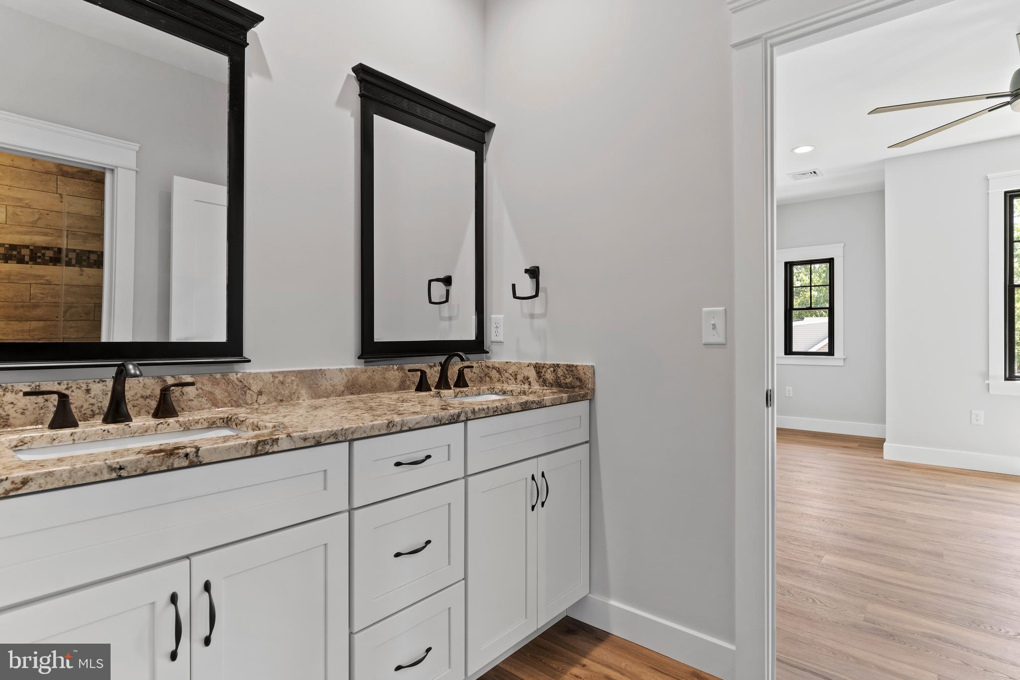 207 Maple Avenue Hershey, PA 17033 - Photo 55 of 79 a bathroom with double sink and a mirror