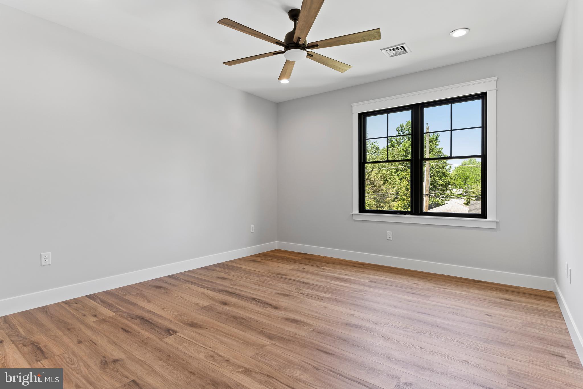 207 Maple Avenue Hershey, PA 17033 - Photo 63 of 79 wooden floor in an empty room with a window