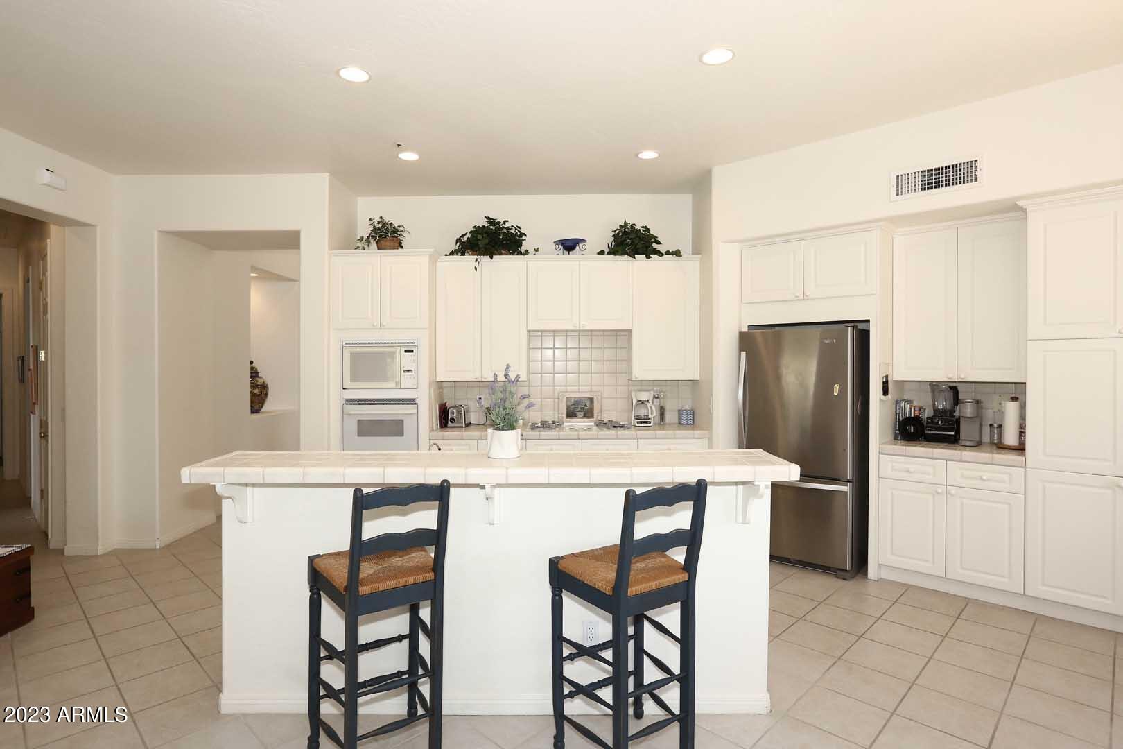 6335 East Marioca Circle Scottsdale, AZ 85266 - Photo 12 of 66 Kitchen Island
