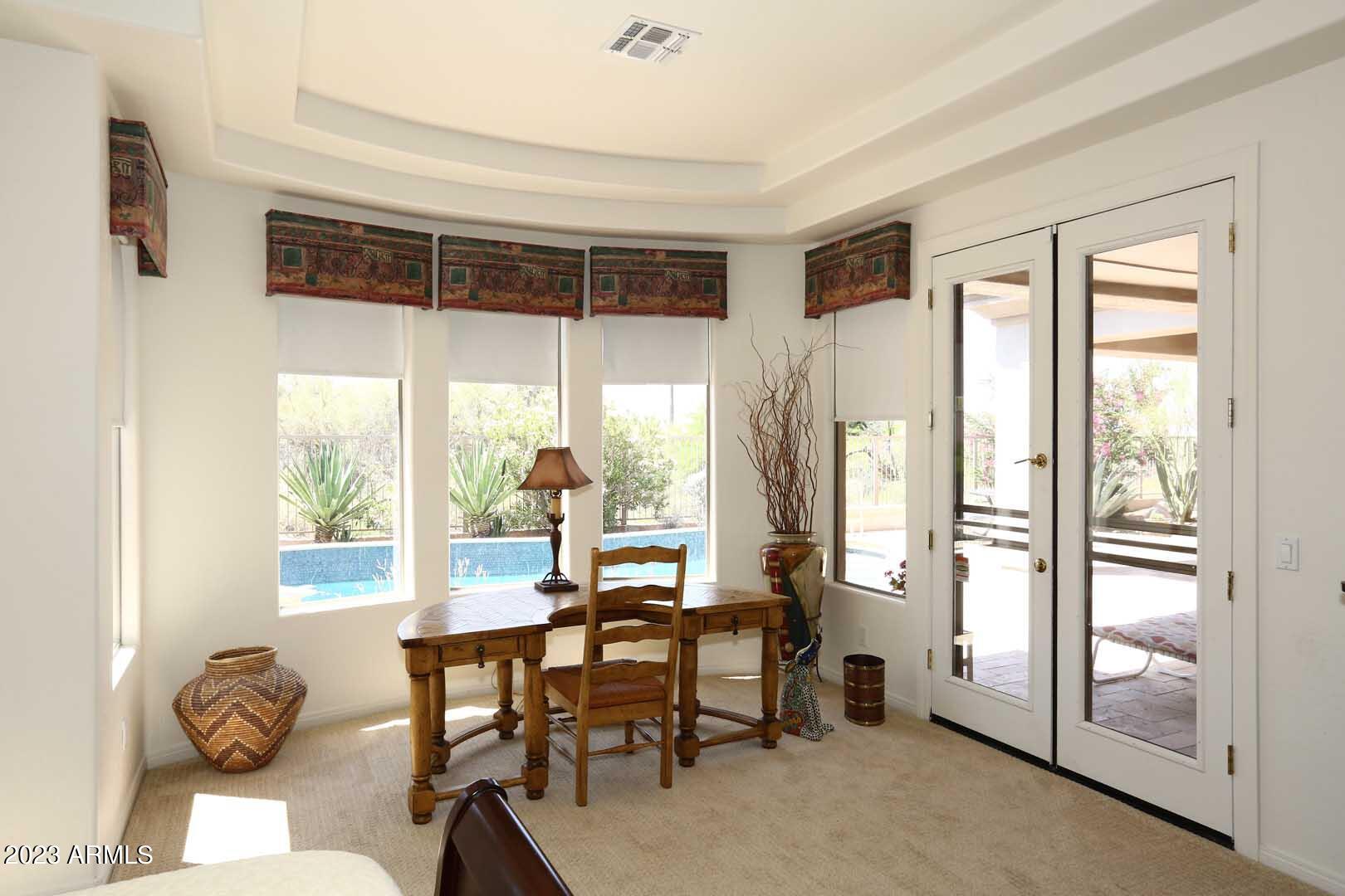 6335 East Marioca Circle Scottsdale, AZ 85266 - Photo 20 of 66 a view of a dining room with furniture window and outside view