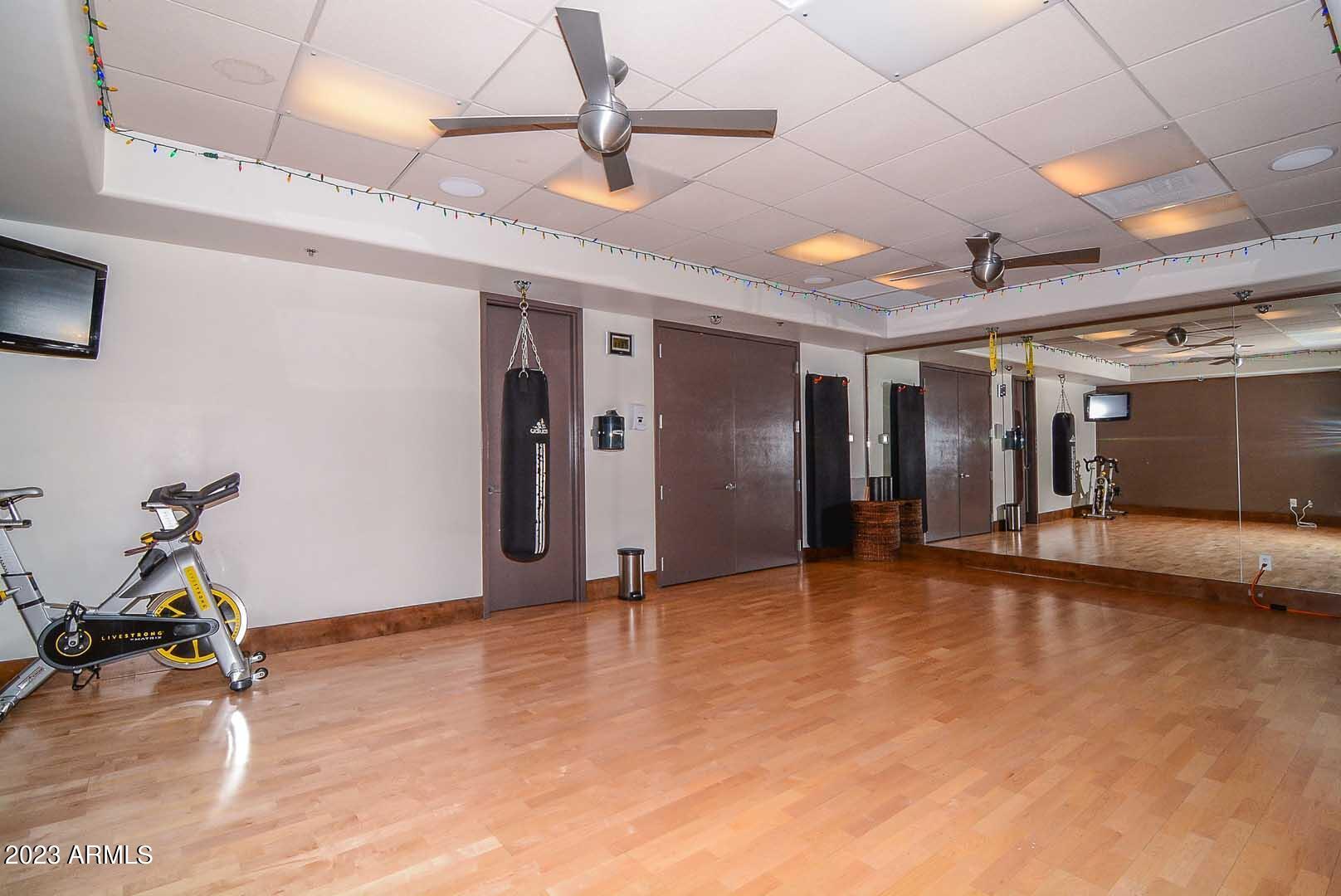 6335 East Marioca Circle Scottsdale, AZ 85266 - Photo 57 of 66 a view of empty room with wooden floor