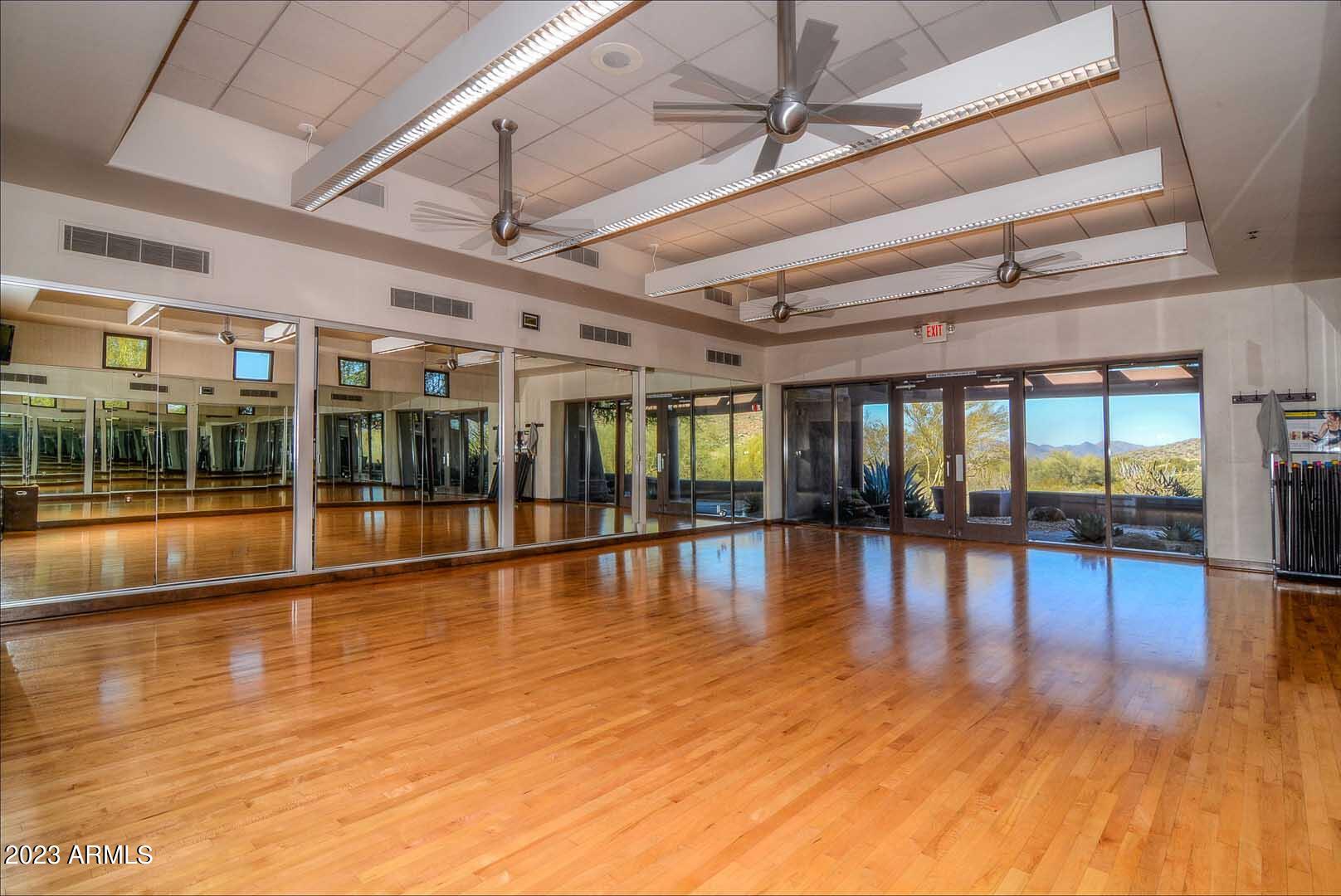 6335 East Marioca Circle Scottsdale, AZ 85266 - Photo 58 of 66 a view of pool window and wooden floor