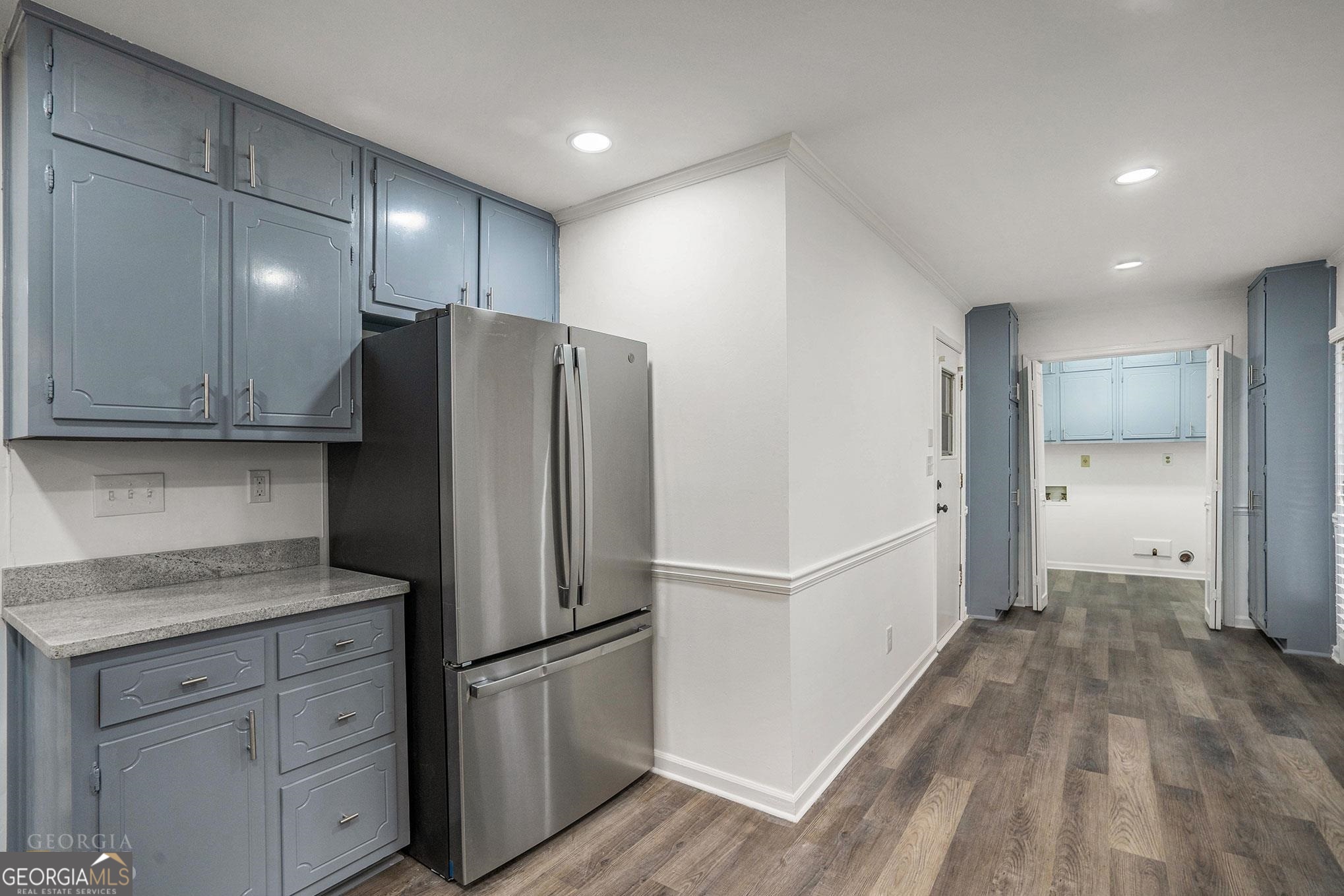 3343 Spring Meadow Court Tucker, GA 30084 - Photo 11 of 24 a kitchen with stainless steel appliances granite countertop a refrigerator and a sink