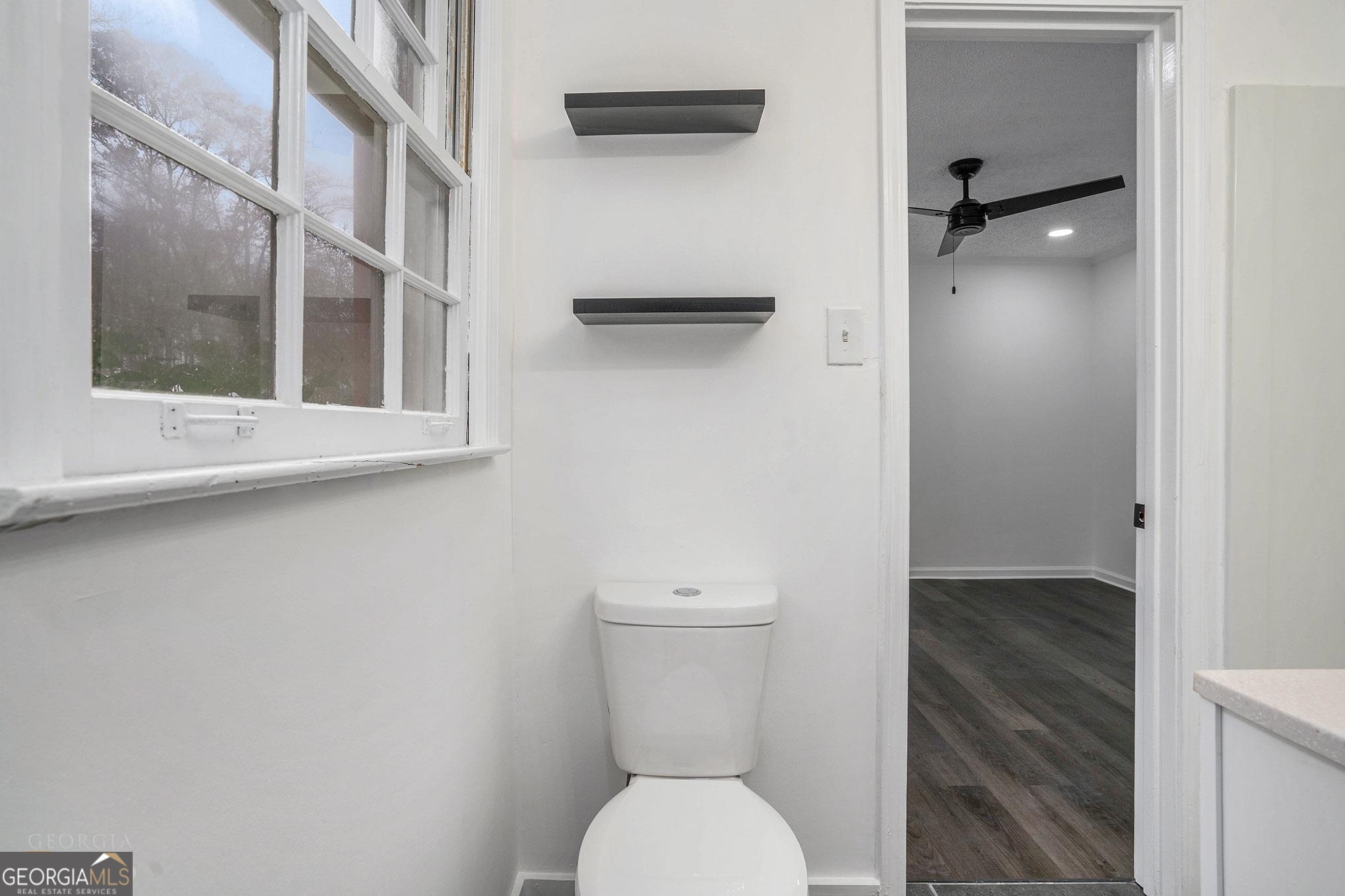 3343 Spring Meadow Court Tucker, GA 30084 - Photo 17 of 24 a bathroom with a toilet