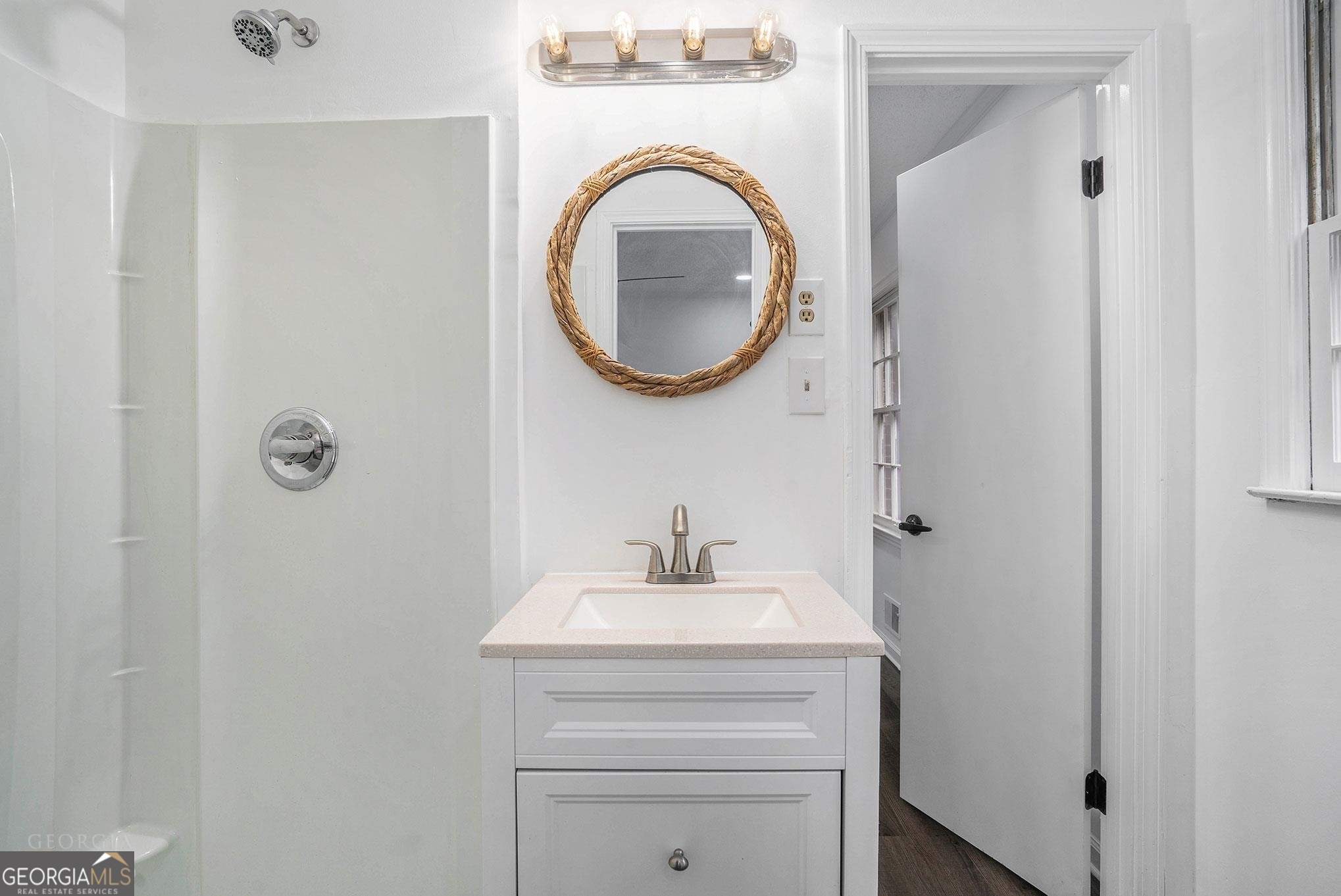 3343 Spring Meadow Court Tucker, GA 30084 - Photo 18 of 24 a bathroom with a sink and a mirror