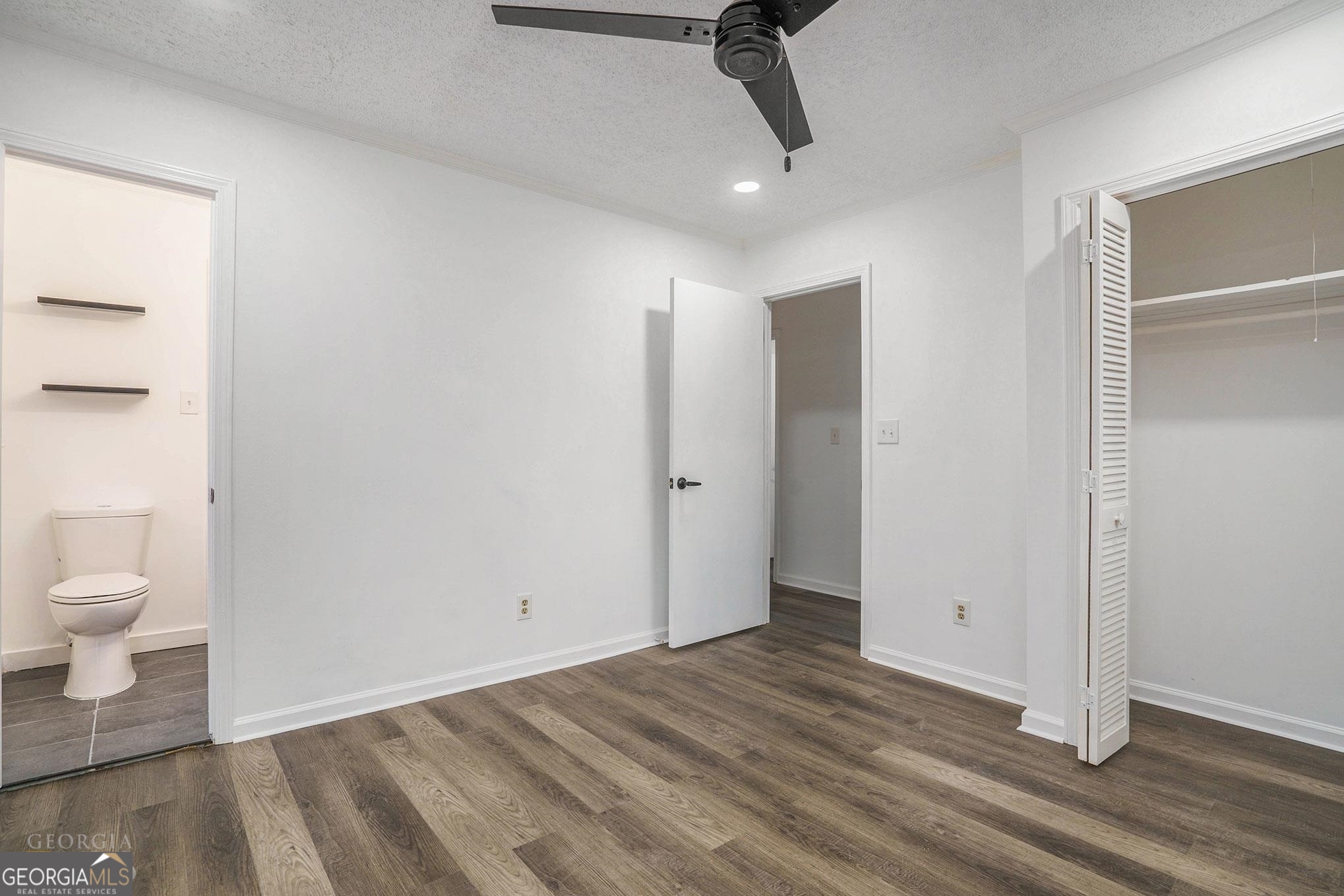 3343 Spring Meadow Court Tucker, GA 30084 - Photo 19 of 24 a view of a bathroom with a sink and a toilet