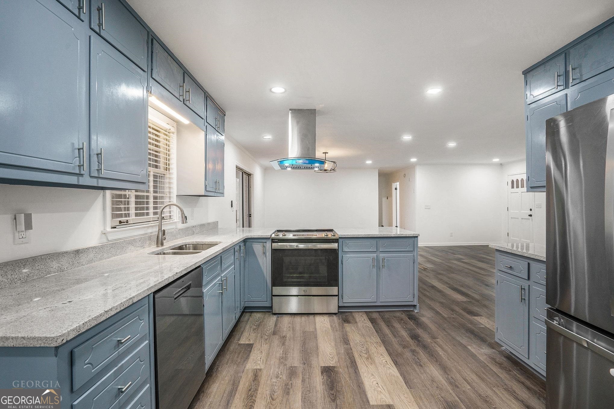 3343 Spring Meadow Court Tucker, GA 30084 - Photo 10 of 24 a kitchen with a sink and a stove top oven